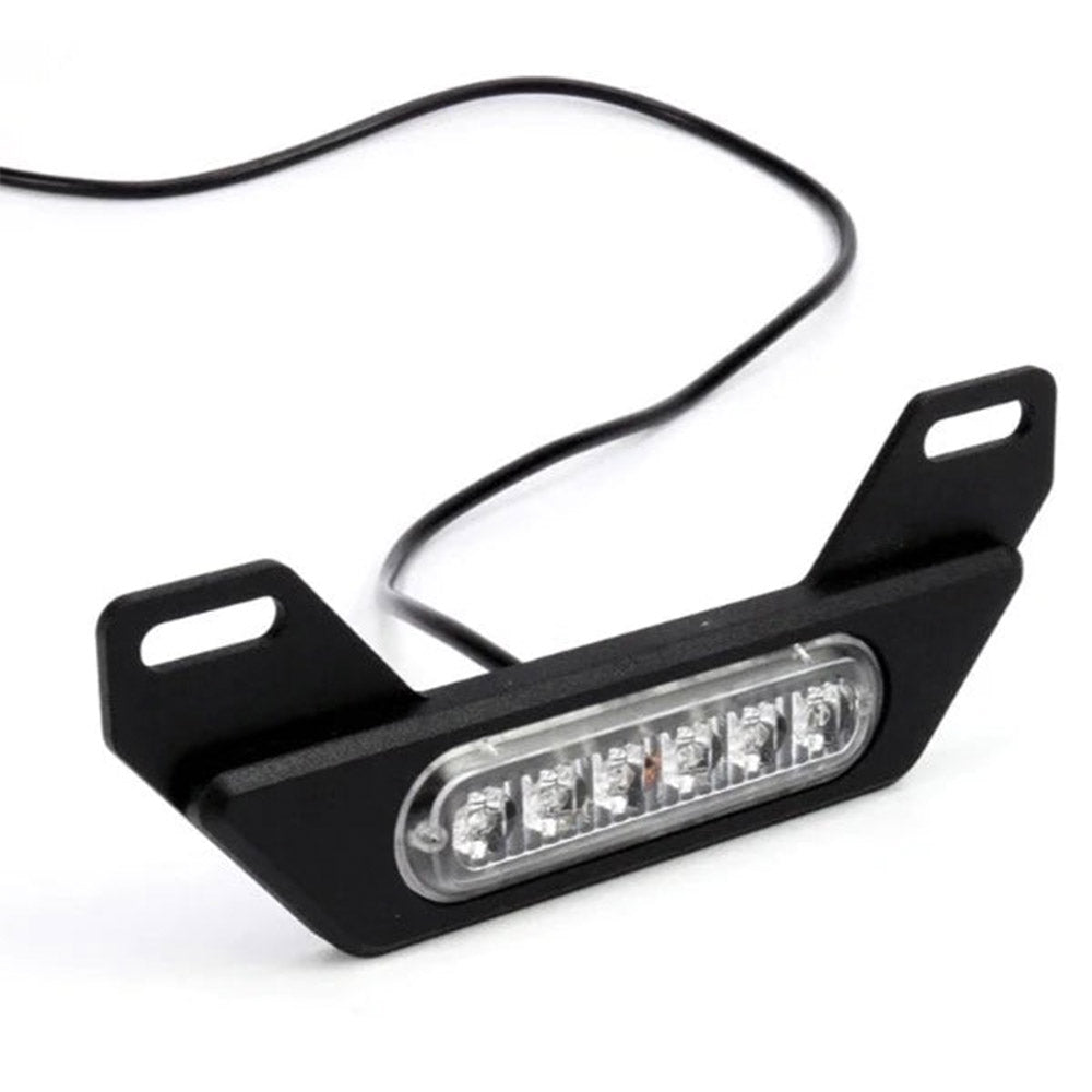 Black LED license plate light bracket with clear lens strip and attached wiring
