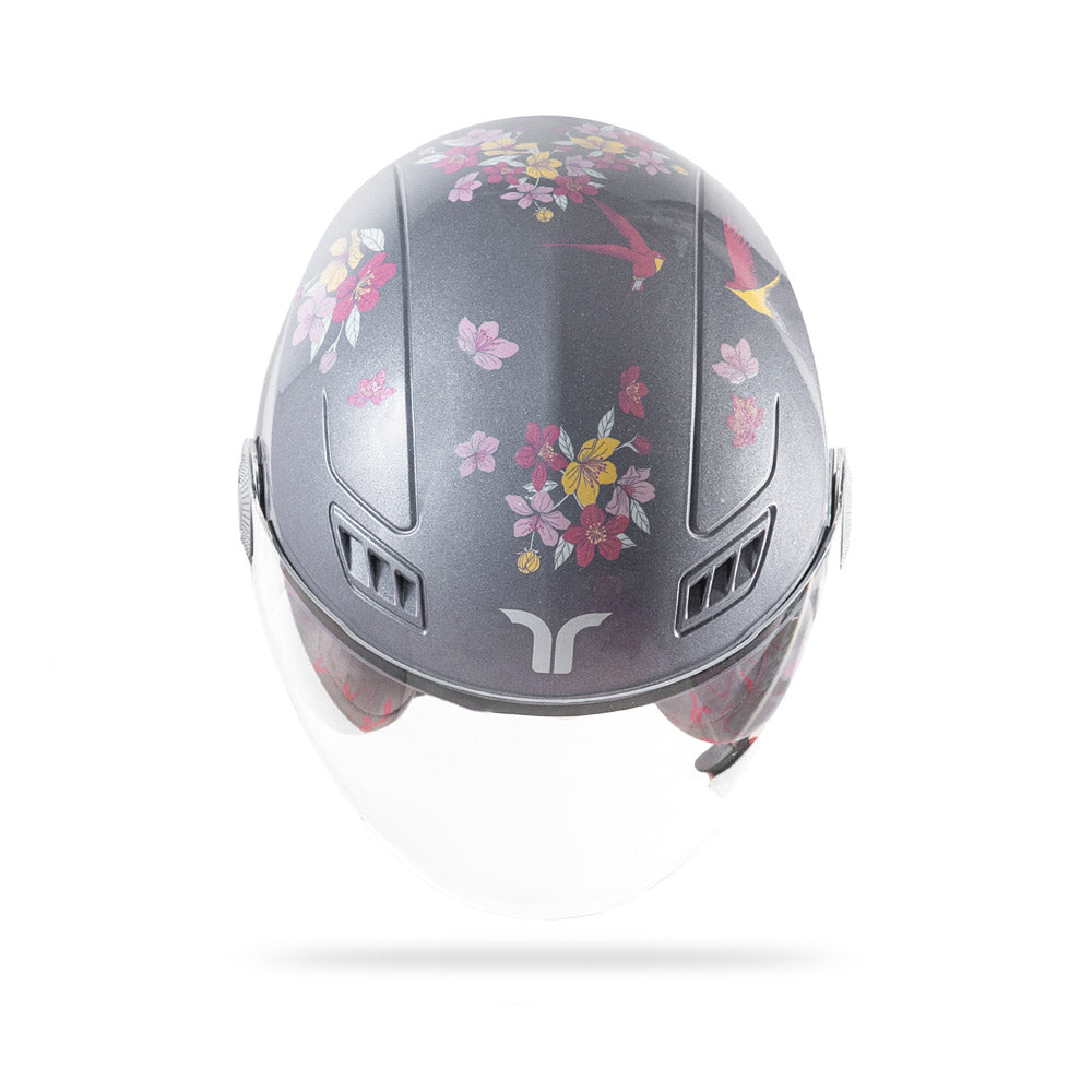 Motorcycle helmet top view in gray-silver with floral blossom pattern