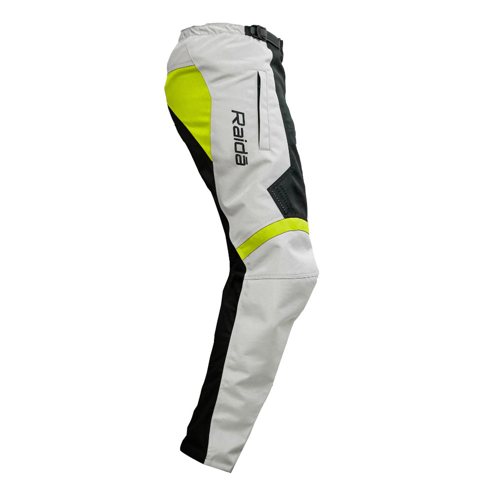 Off-road riding pants in light grey with hi-viz green panels and black side stripes