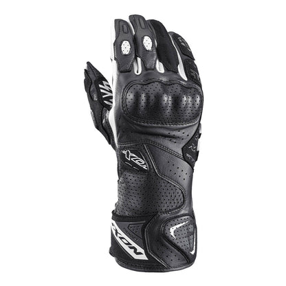 Black and white motorcycle gloves with padded knuckle protectors and white logo panels