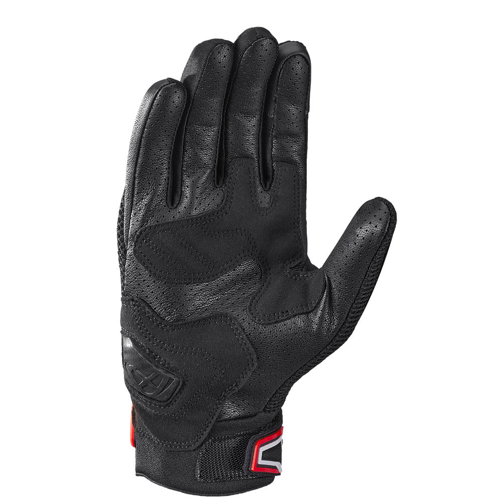 Black motorcycle gloves with bright red cuff and textured knuckle padding