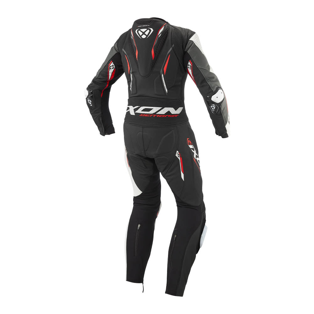 Black motorcycle racing suit with red piping and white side panels, long sleeve legs