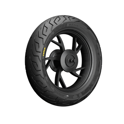 Tubeless motorcycle tire and wheel close-up with tread grooves, dark grey/black