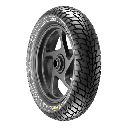Tubeless tire with deep tread and silver wheel rim, sidewall lettering