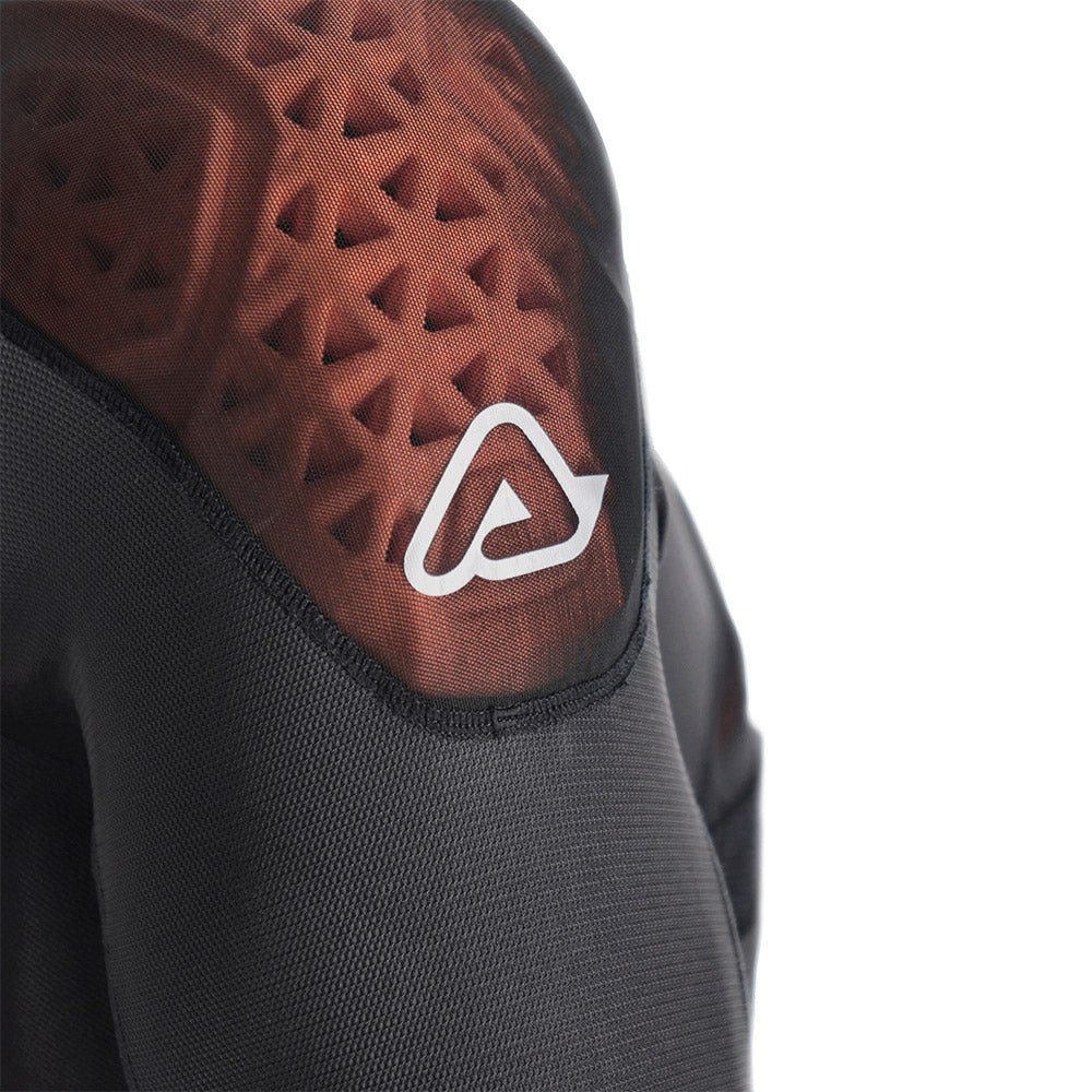 Black body armor vest with textured orange-brown impact pad and white logo