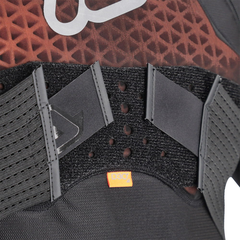 Black armor vest interior with D3O label and mesh strap panels
