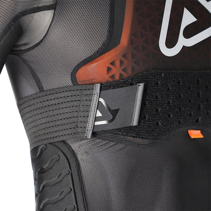 Black armor vest close-up of side straps, D3O panel, and molded logo