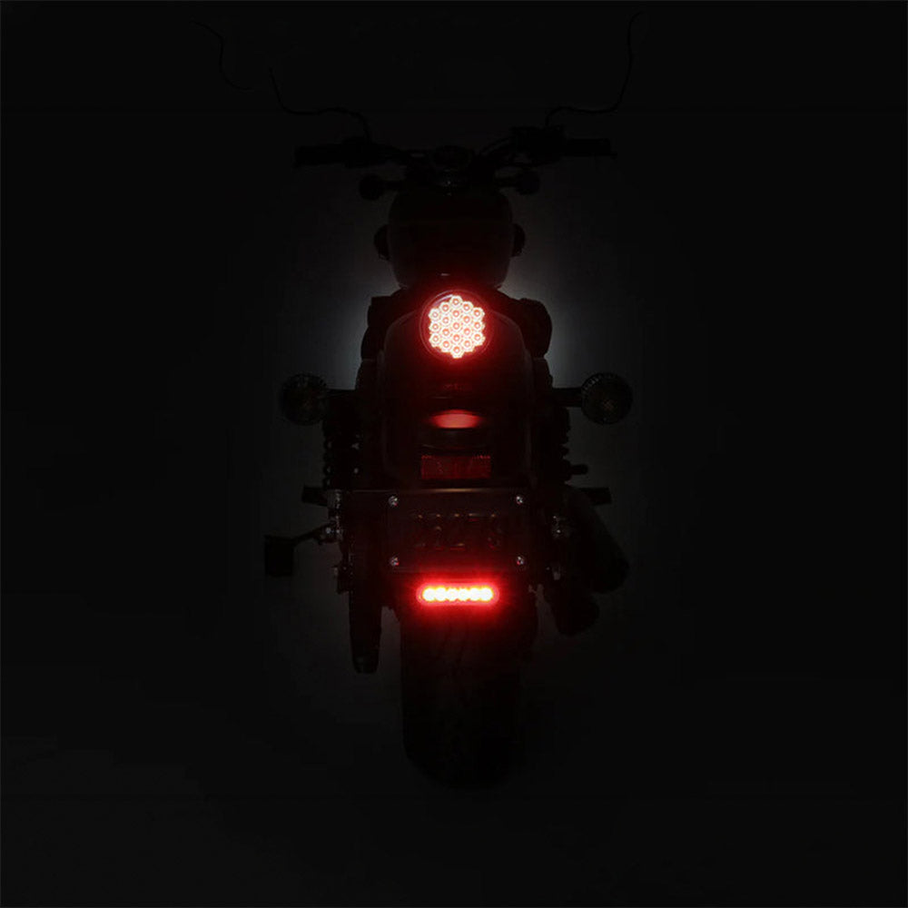 Rear view of motorcycle with black auxiliary brake light and red LED illumination