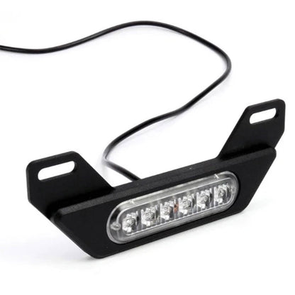 Black LED license plate light bracket with clear lens strip and attached wiring