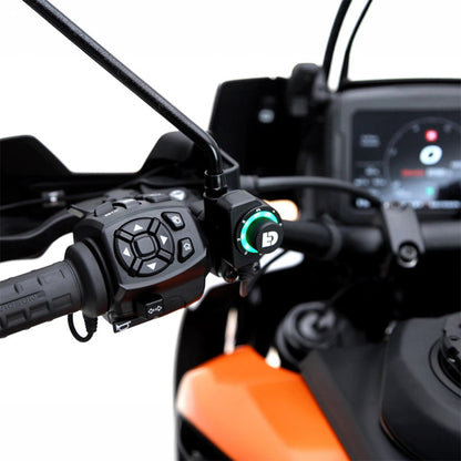 Black DialDim lighting controller installed on handlebars with glowing dial