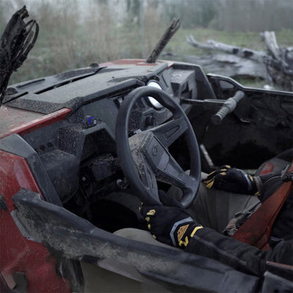 DialDim controller mounted near steering wheel on off-road vehicle dashboard