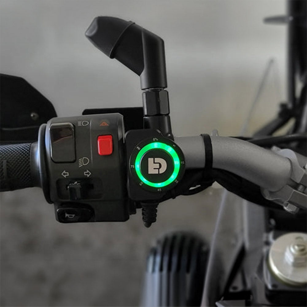 DialDim lighting controller dial with green ring and button switches on handlebar