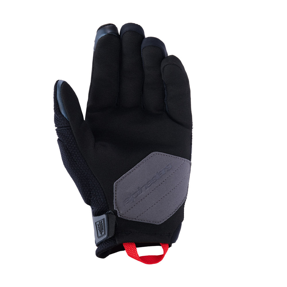 Black motorcycle gloves with gray palm panel and bright red cuff accent, padded knuckles