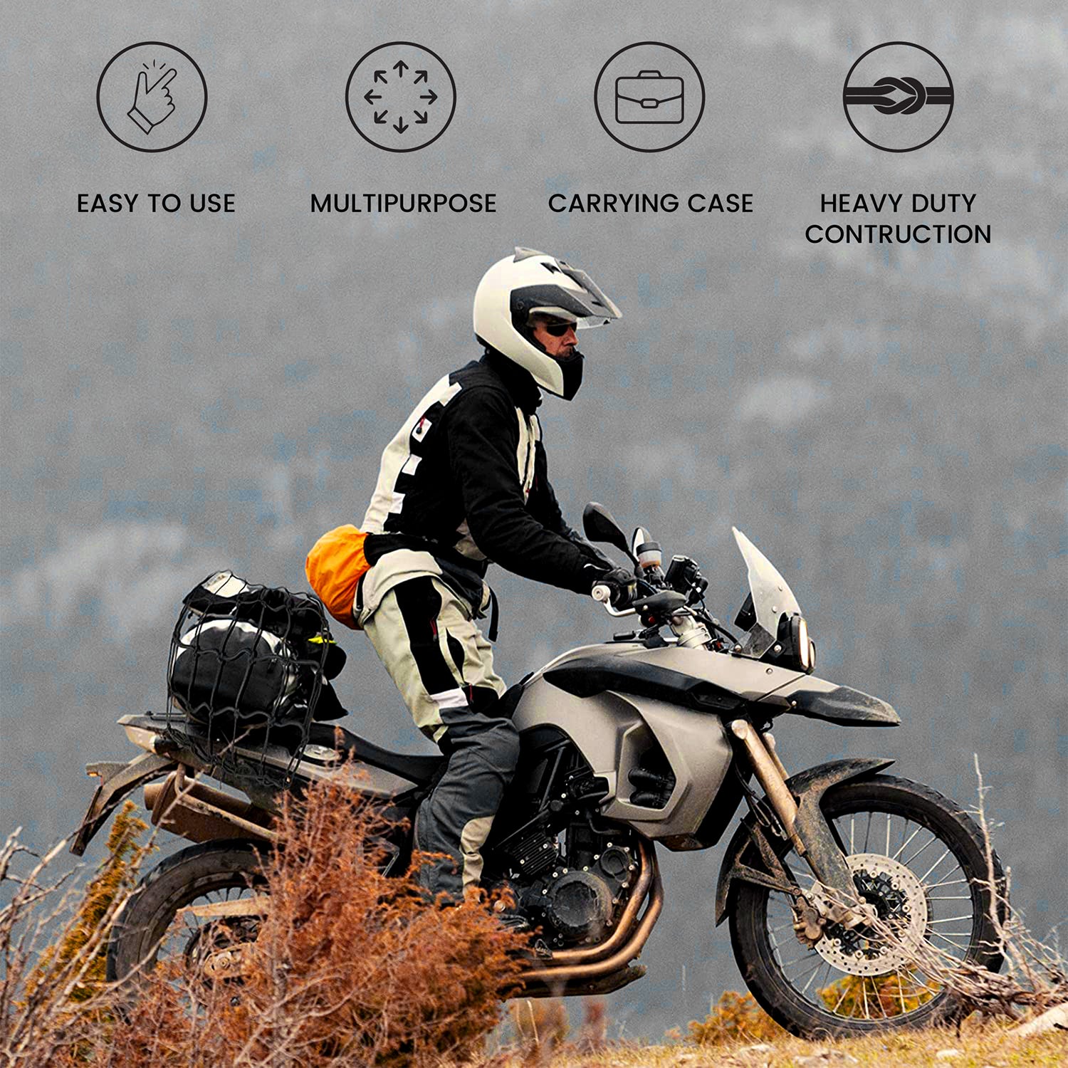 Black cargo net secured with bungee cords on a motorcycle