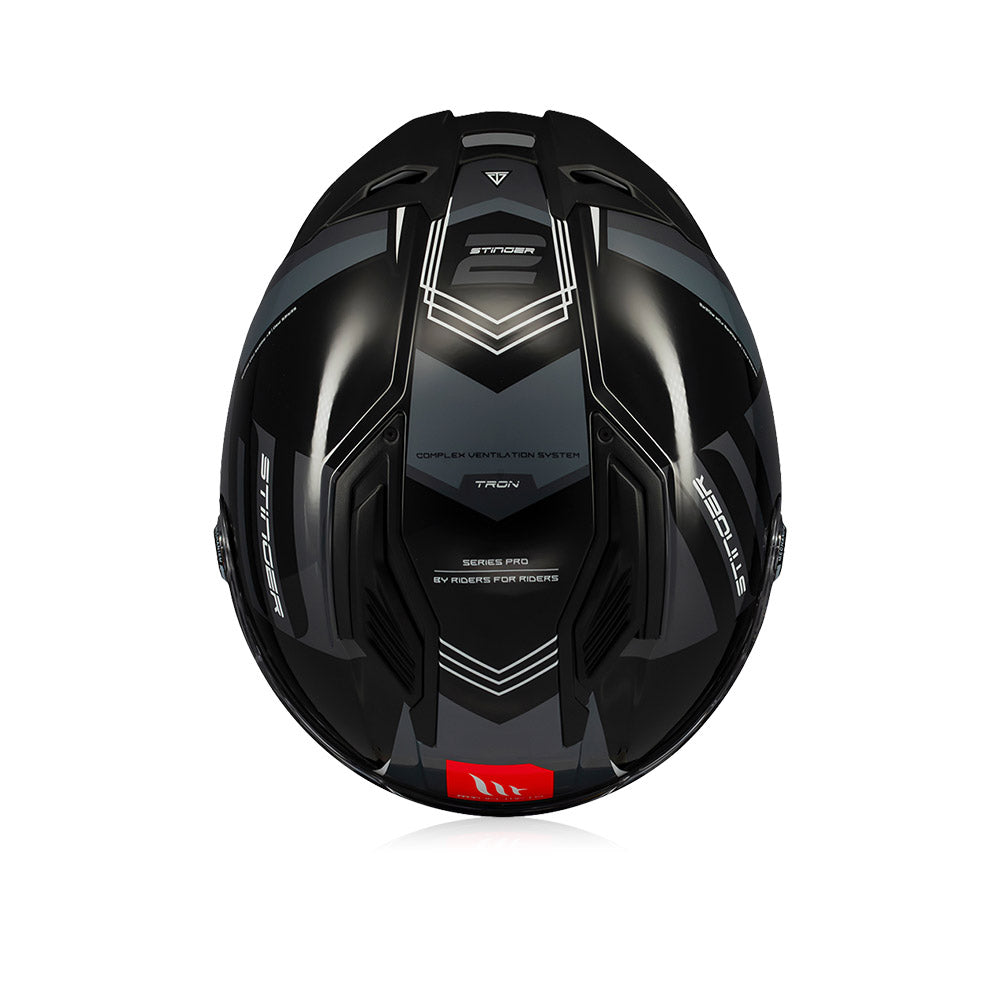Gloss black full-face helmet back panel with geometric vent lines and red MT badge