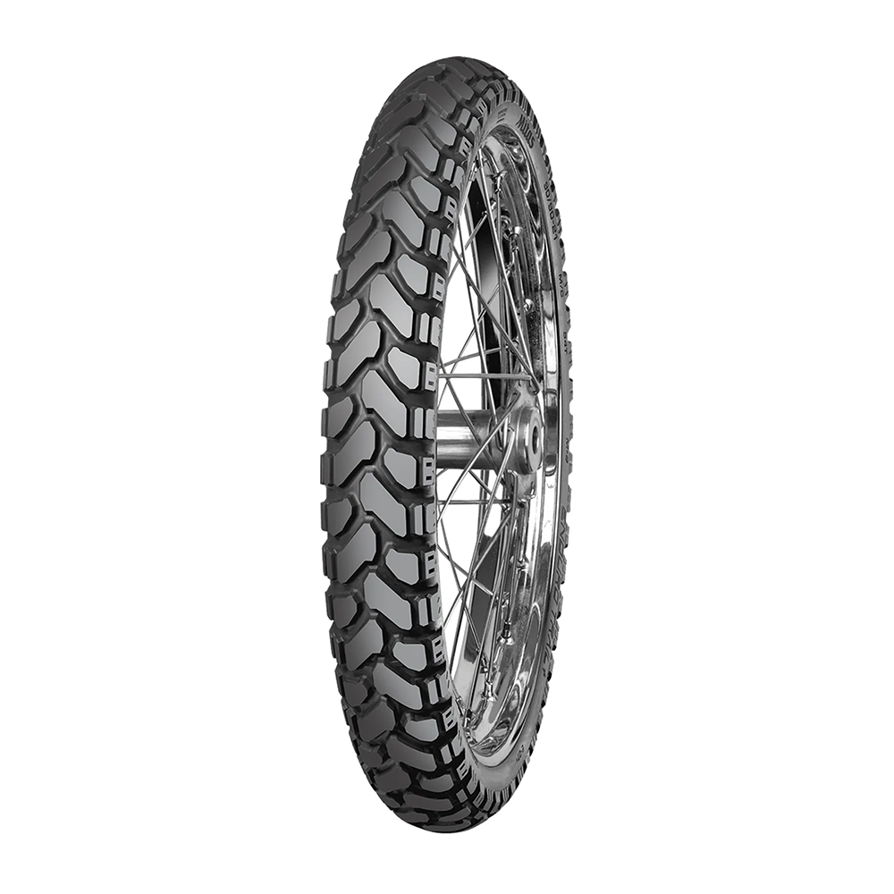 Front tubeless trail motorcycle tire with knobby black tread