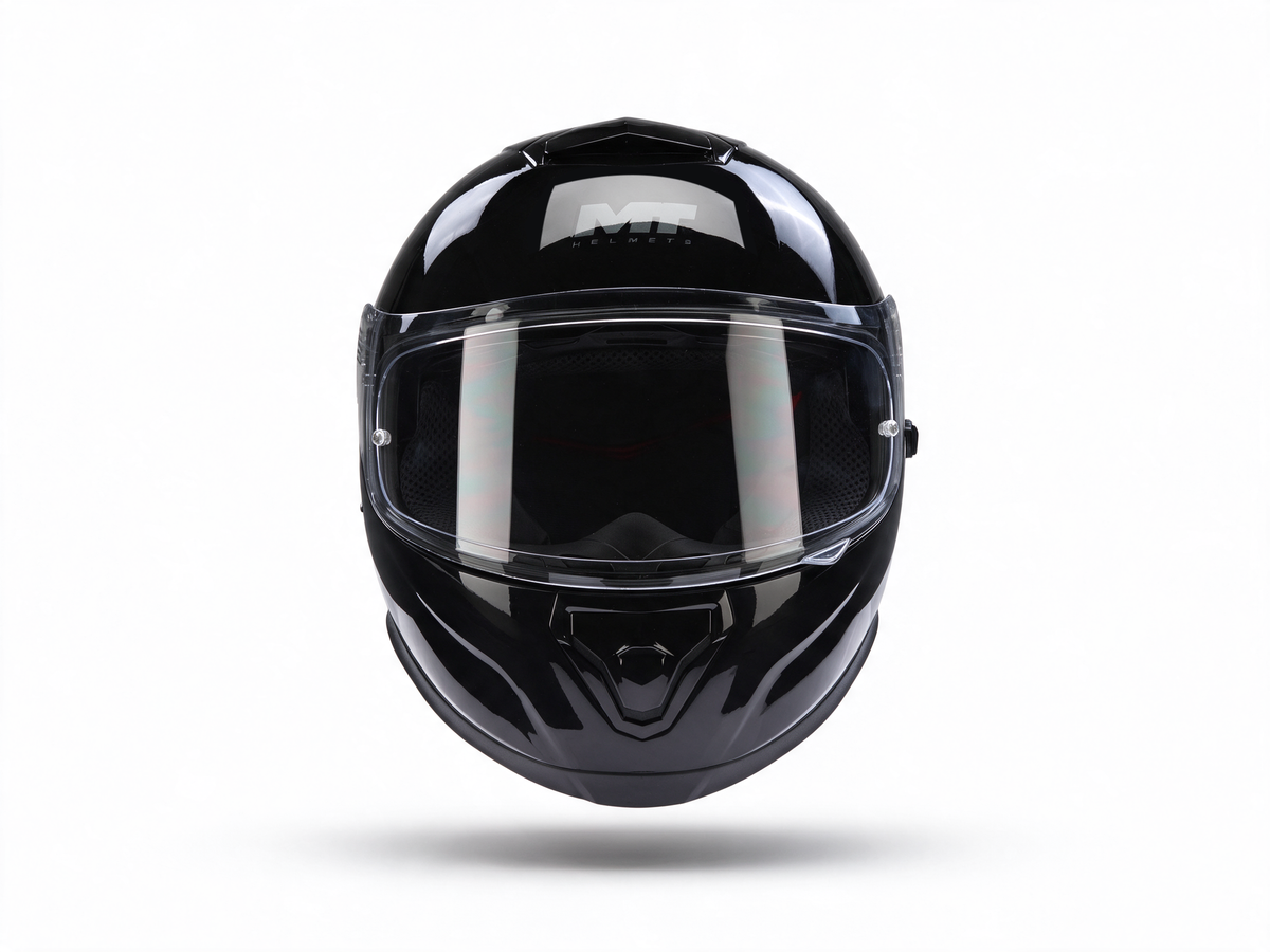 Black full-face motorcycle helmet with clear visor and top logo panel