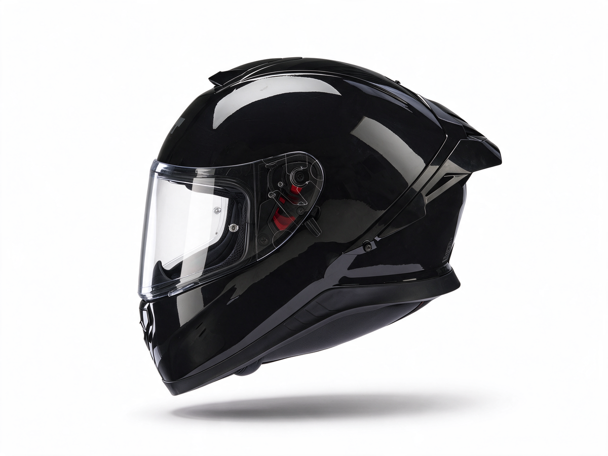 Black motorcycle helmet side view with flip-down clear visor and chin guard