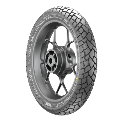 Tube-type rear tyre side view with rugged block tread on dark silver alloy wheel