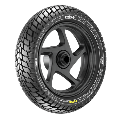 tripR black tubeless tyre with black rim, close angled tread pattern and grooves