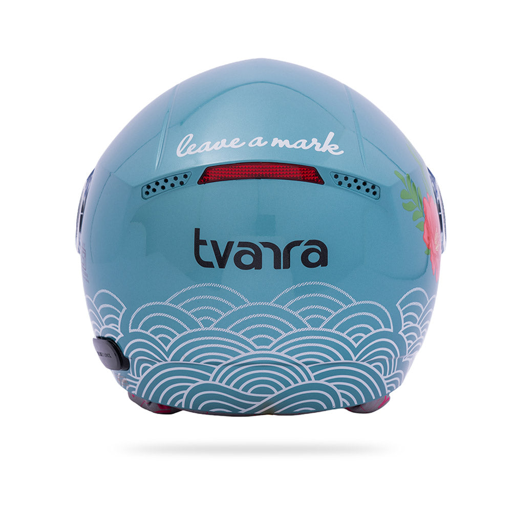 Aqua blue motorcycle helmet shell with wave pattern and rear ventilation cutouts