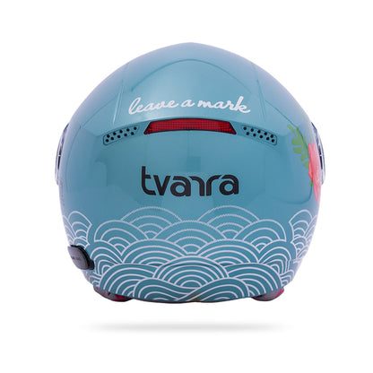 Aqua blue motorcycle helmet shell with wave pattern and rear ventilation cutouts