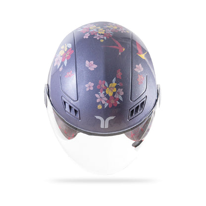 Motorcycle riding helmet top view in dark lilac with colorful floral pattern