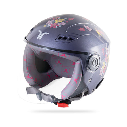 Motorcycle riding helmet 3/4 view with floral print, clear visor, and ventilation ports