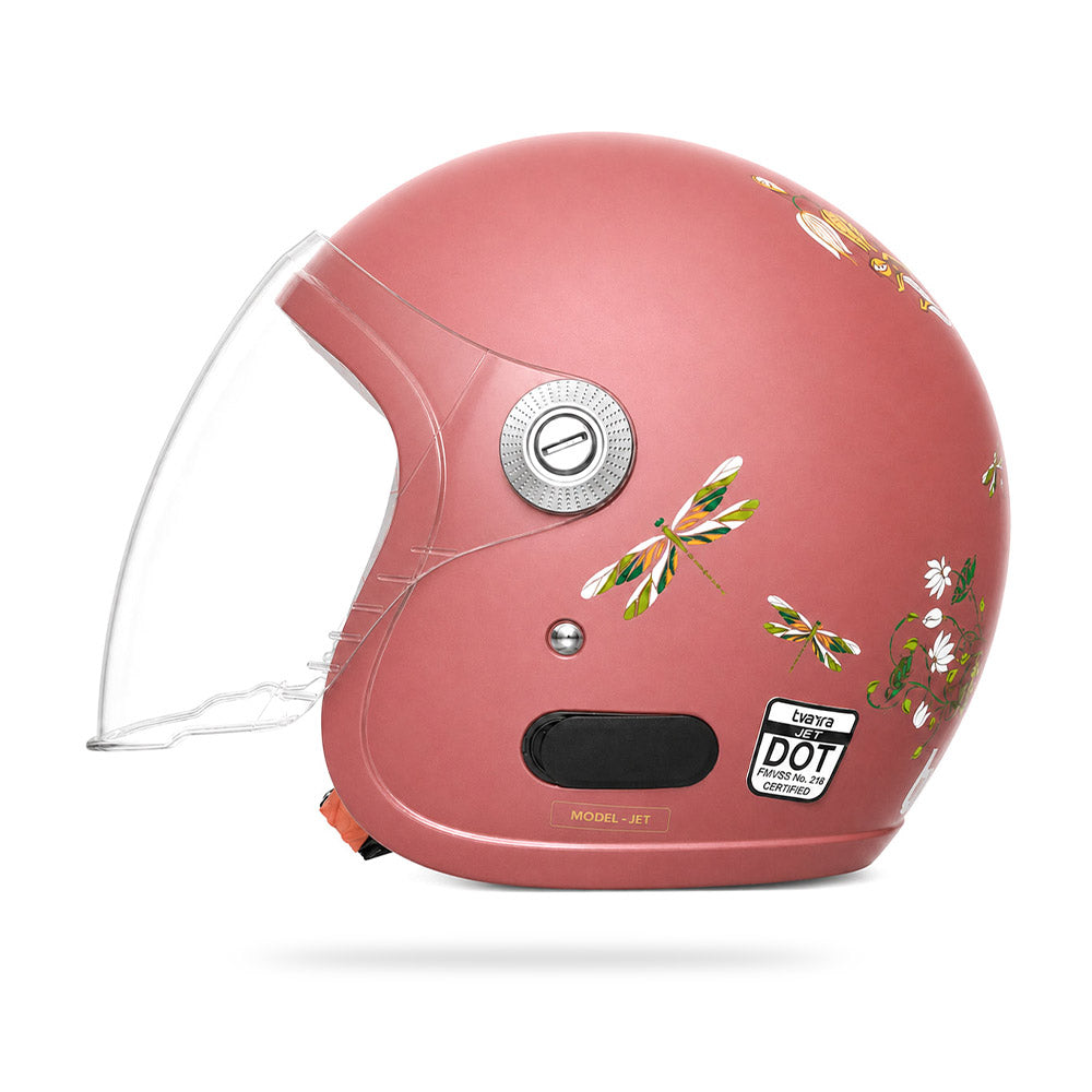 Motorcycle riding helmet, coral shell with floral decal and clear face shield