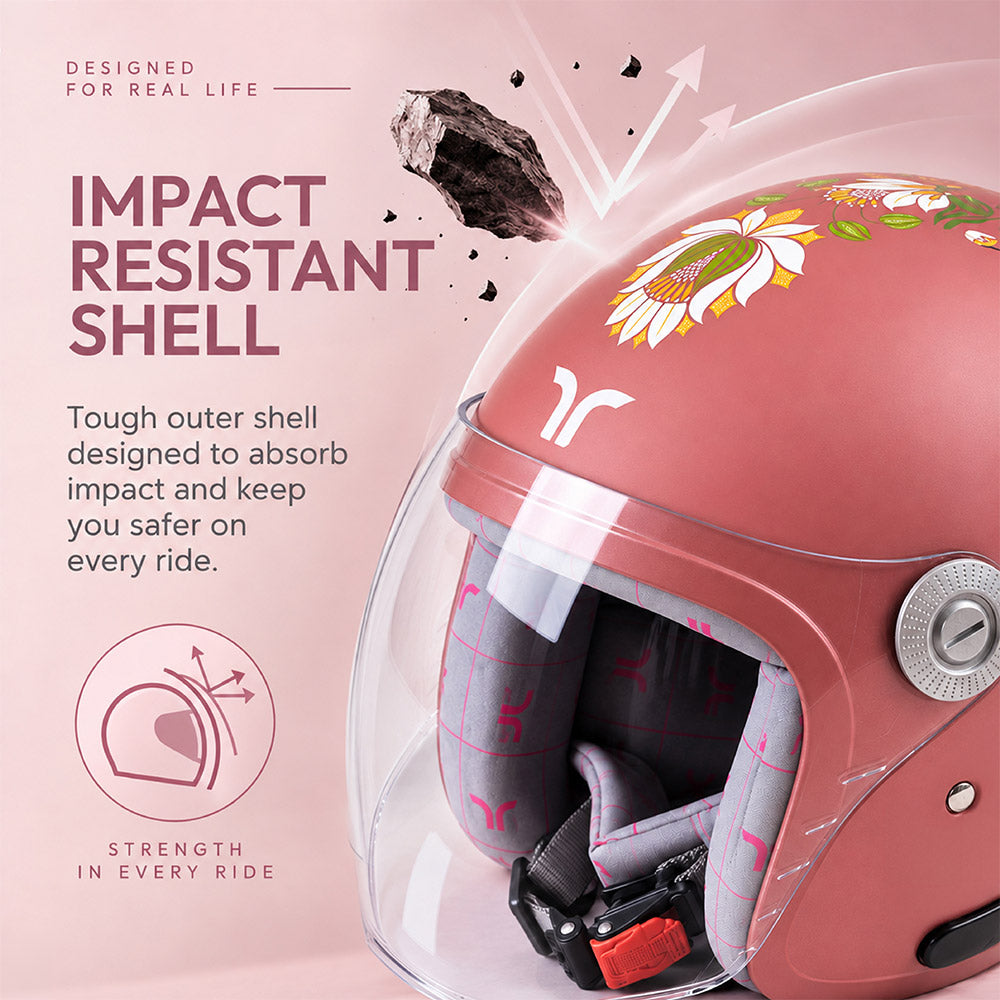 Motorcycle riding helmet interior close-up with clear visor and gray protective padding
