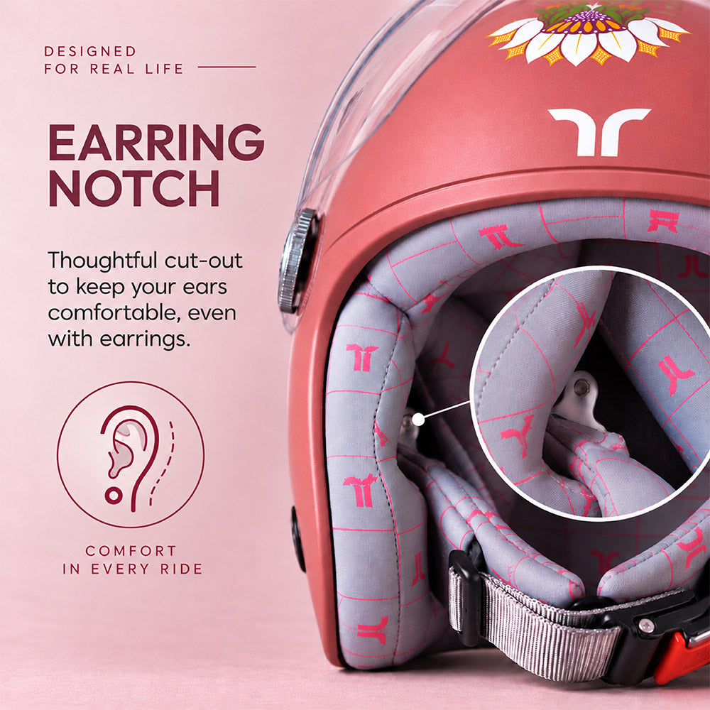 Motorcycle riding helmet ear cut-out, showing gray comfort padding and lining