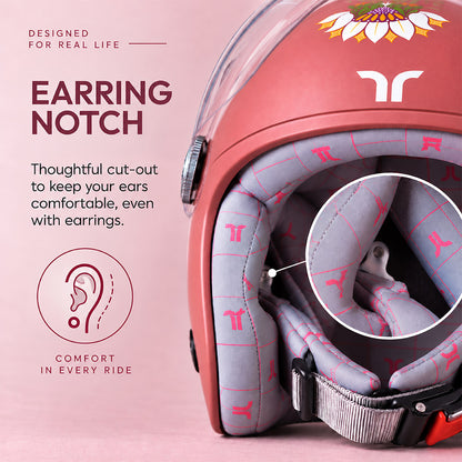 Motorcycle riding helmet ear cut-out, showing gray comfort padding and lining