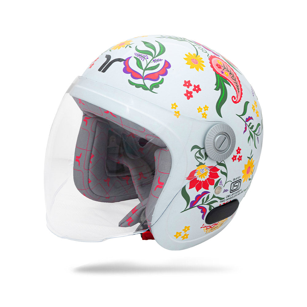 Pearl white motorcycle helmet with floral decal, clear visor, and side vent control dial