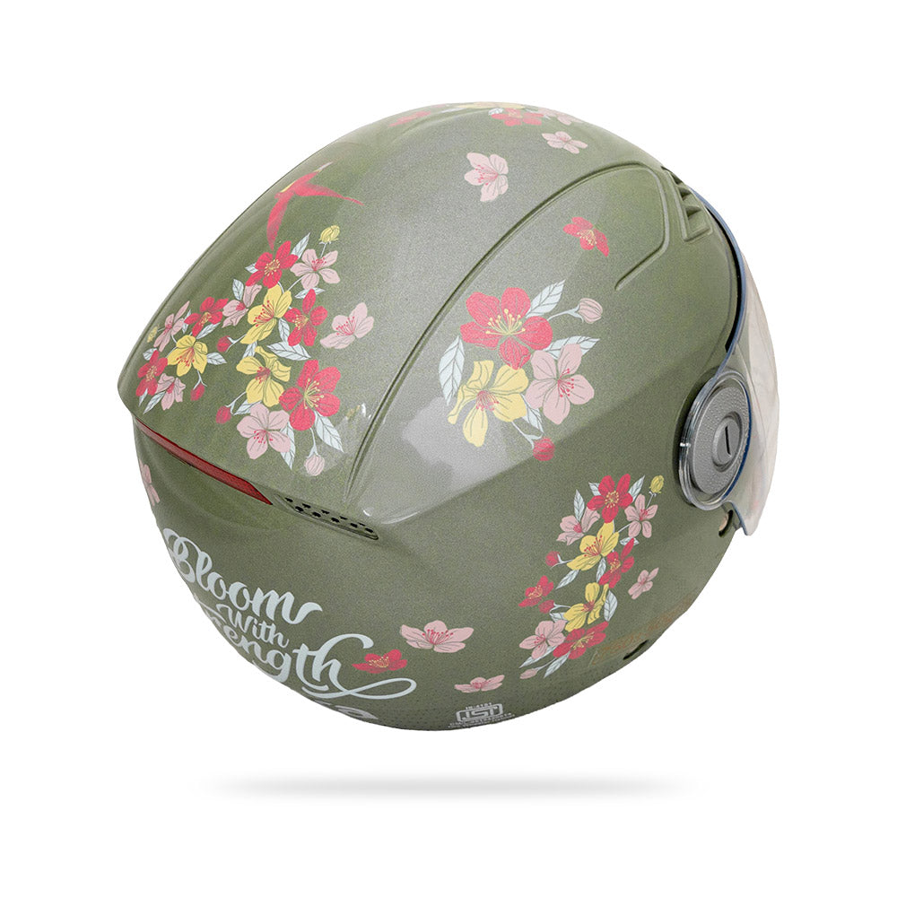 Jade green helmet with side floral bouquet print and vent panel