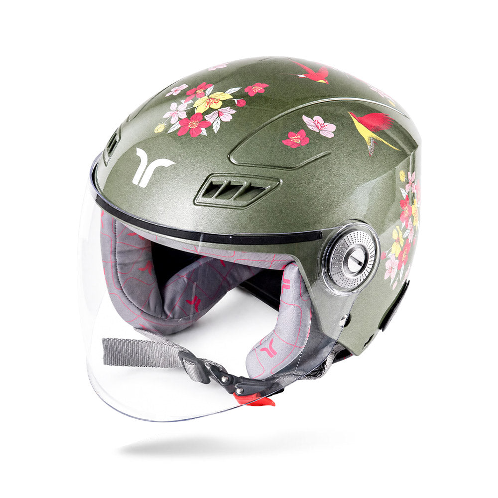 Women’s jade green motorcycle helmet with clear visor and colorful floral pattern