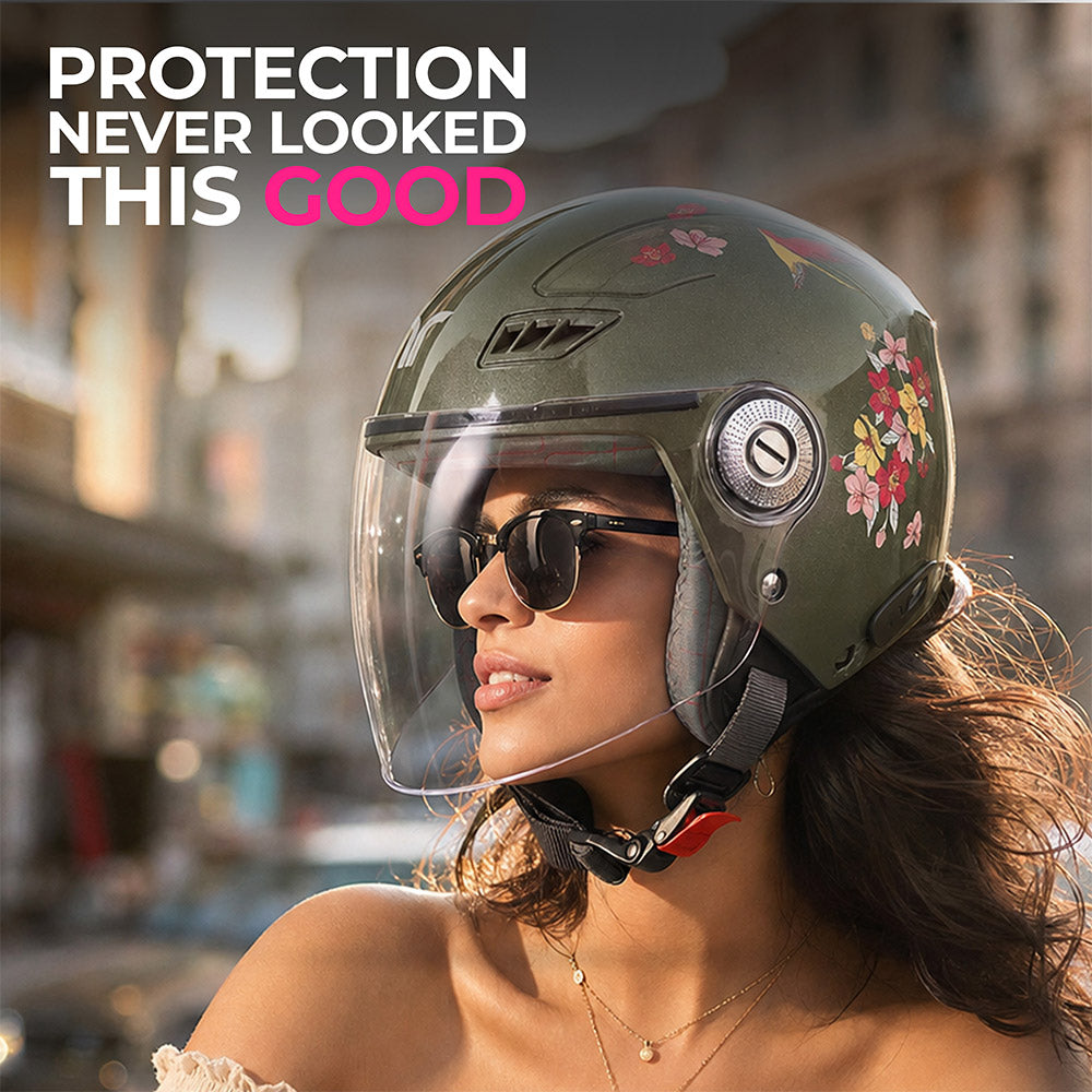 Jade green women’s motorcycle helmet with clear face shield and floral side print