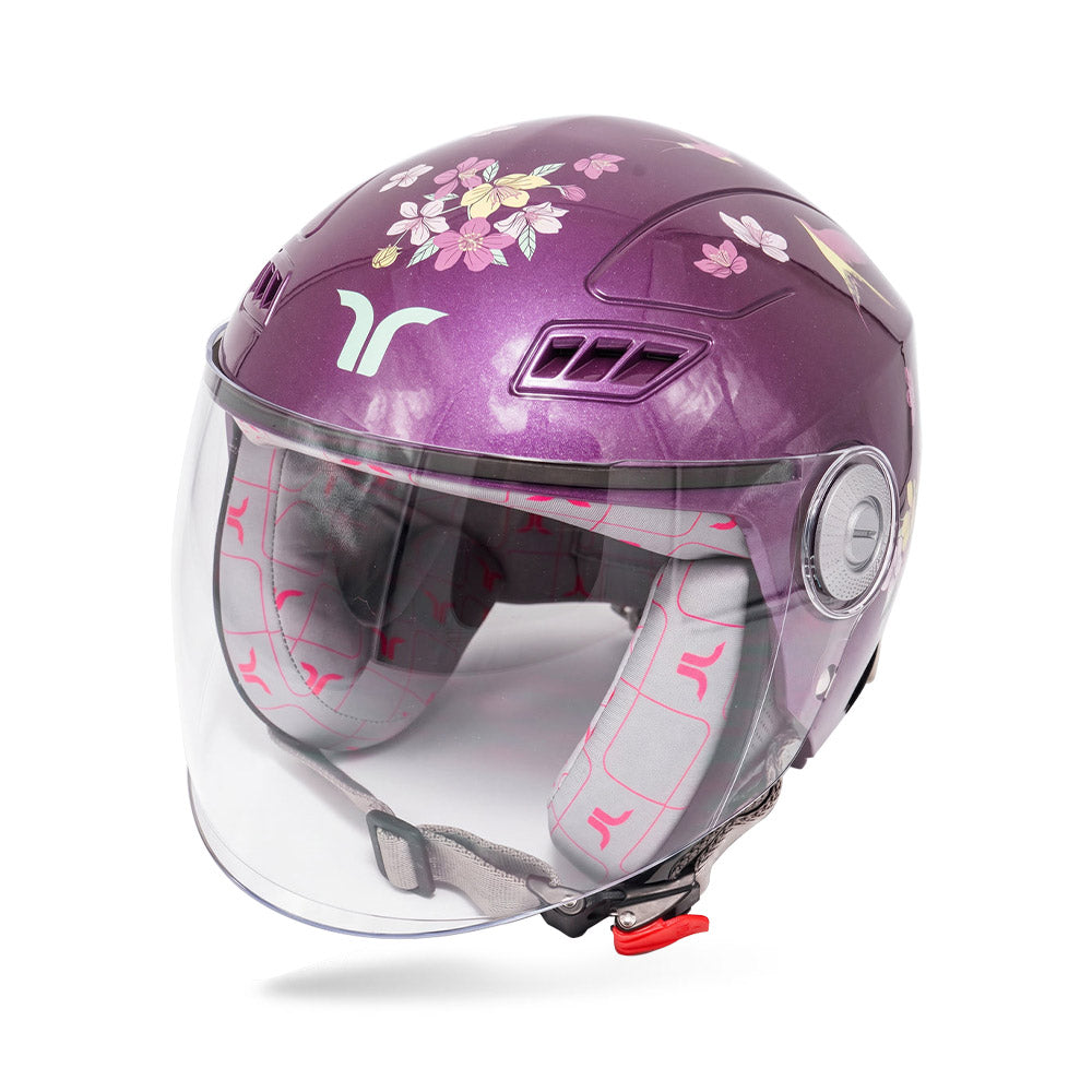 Violet full-face motorcycle helmet with clear visor and floral graphics
