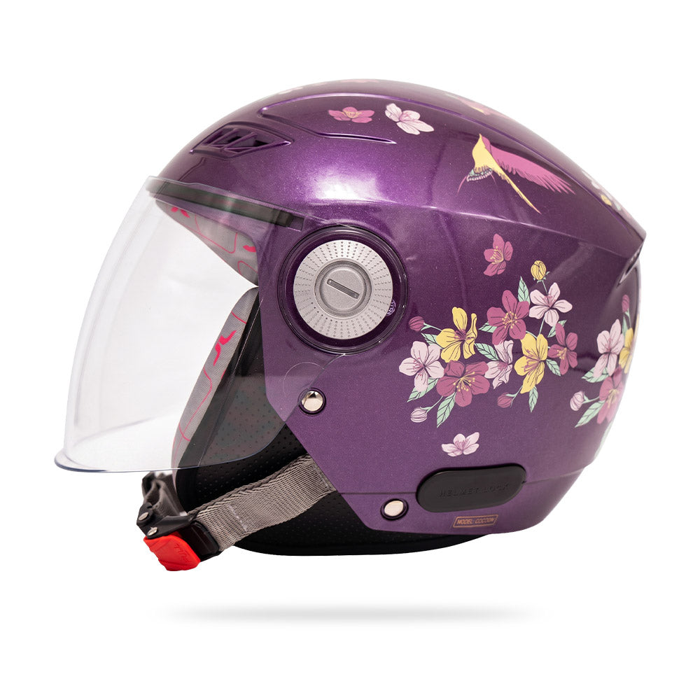Violet full-face motorcycle helmet with clear visor, chin strap, flower side design