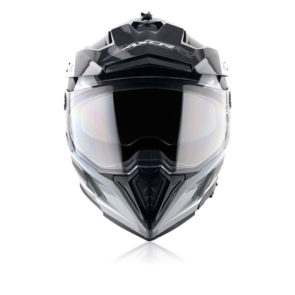Off-road riding helmet front view with dark visor and white/black chin guard